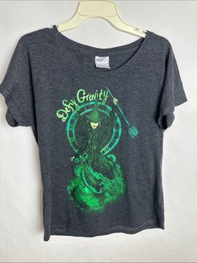 Wicked musical charcoal gray “Defy Gravity” tee, size L